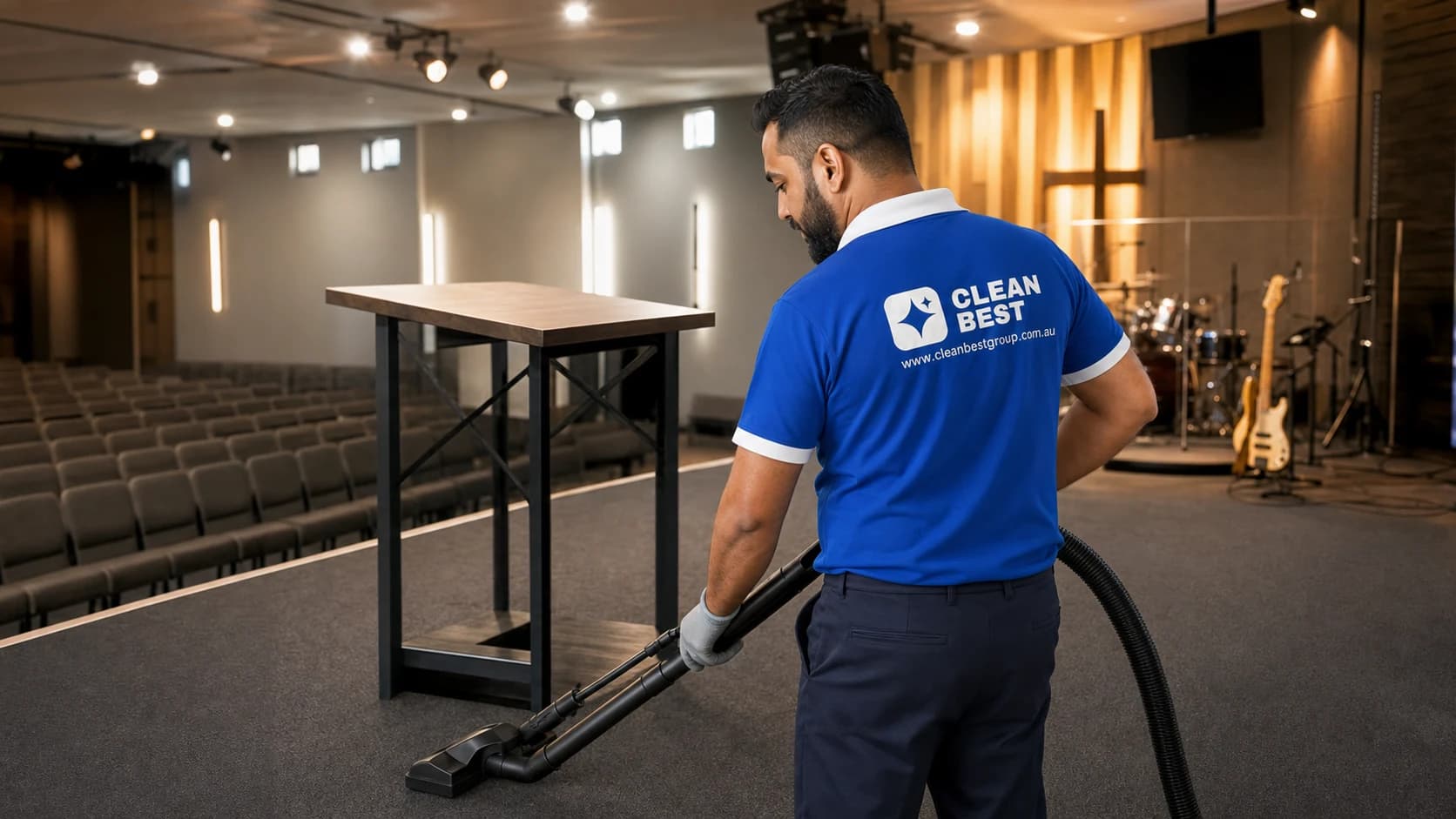 Detail of a Clean Best cleaner vacuuming a carpeted prayer hall floor in Auburn NSW